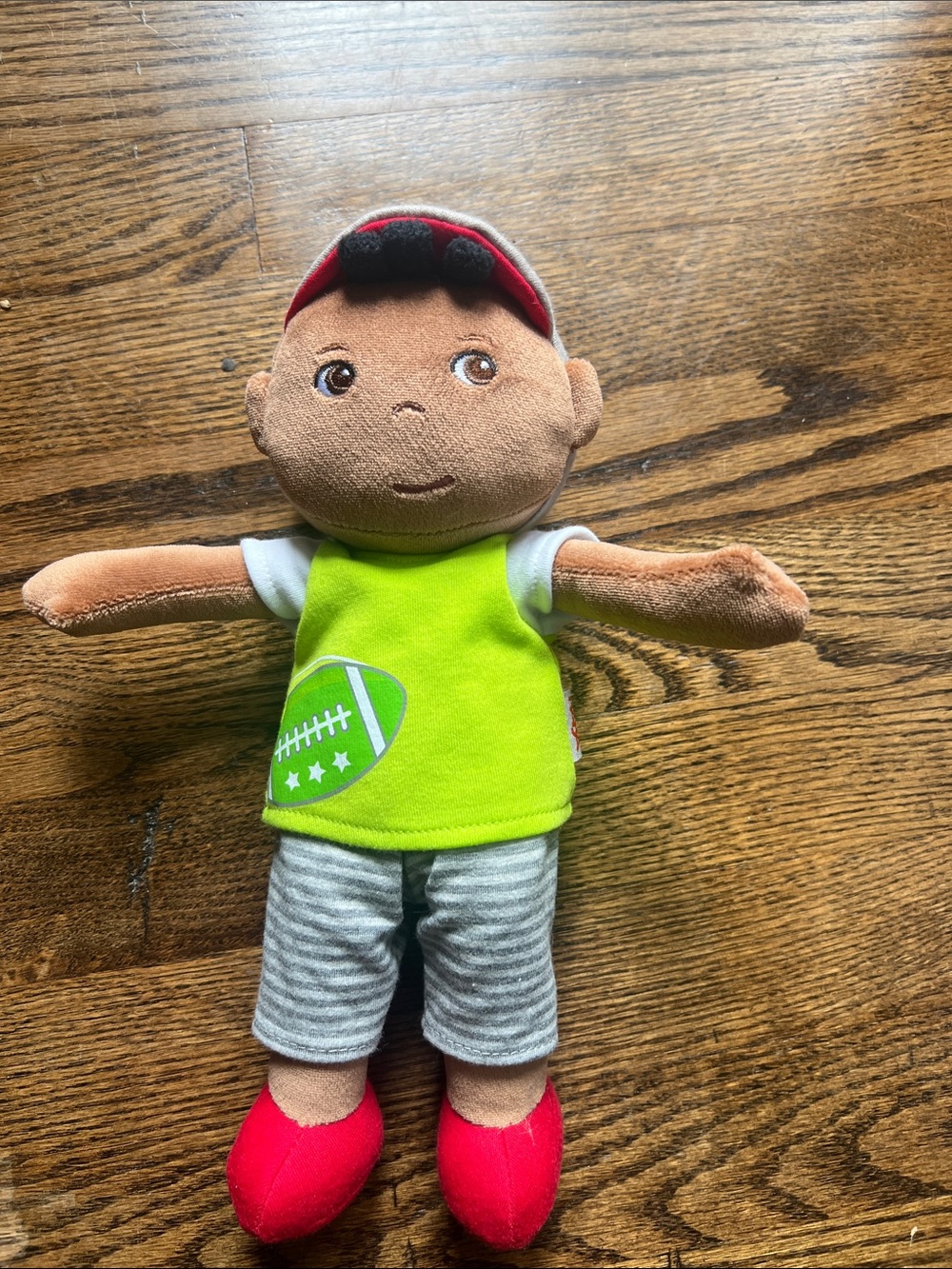 Haba Mason Doll- Plush Brown Baby Doll with Lime Green Shirt and Red Shoes
